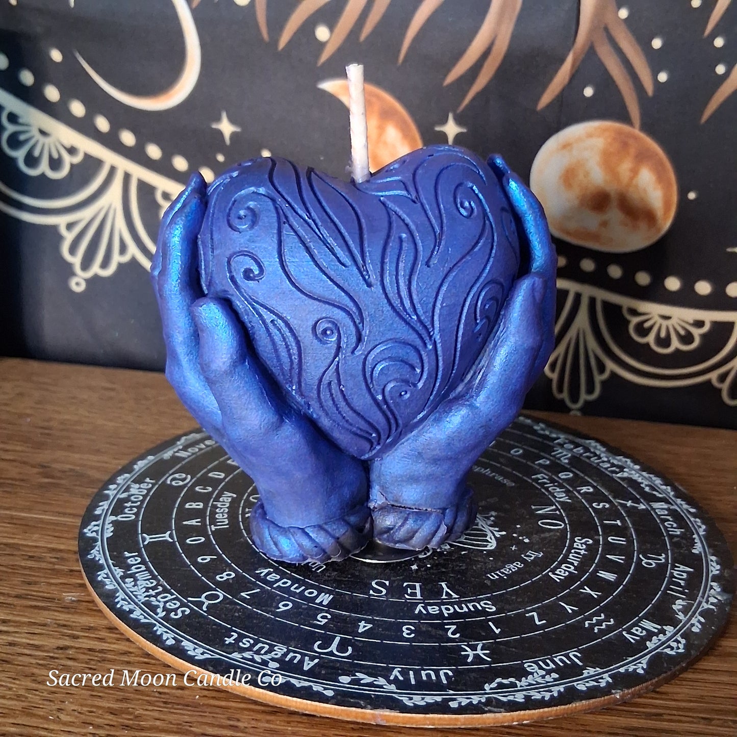 The Alchemist Embrace Saffron and Patchouli Scented Heart in Hands Candle