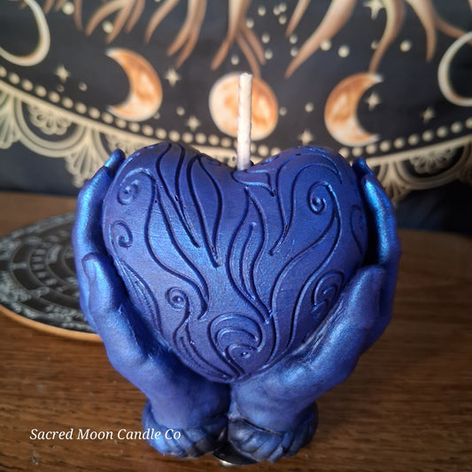 The Alchemist Embrace Saffron and Patchouli Scented Heart in Hands Candle