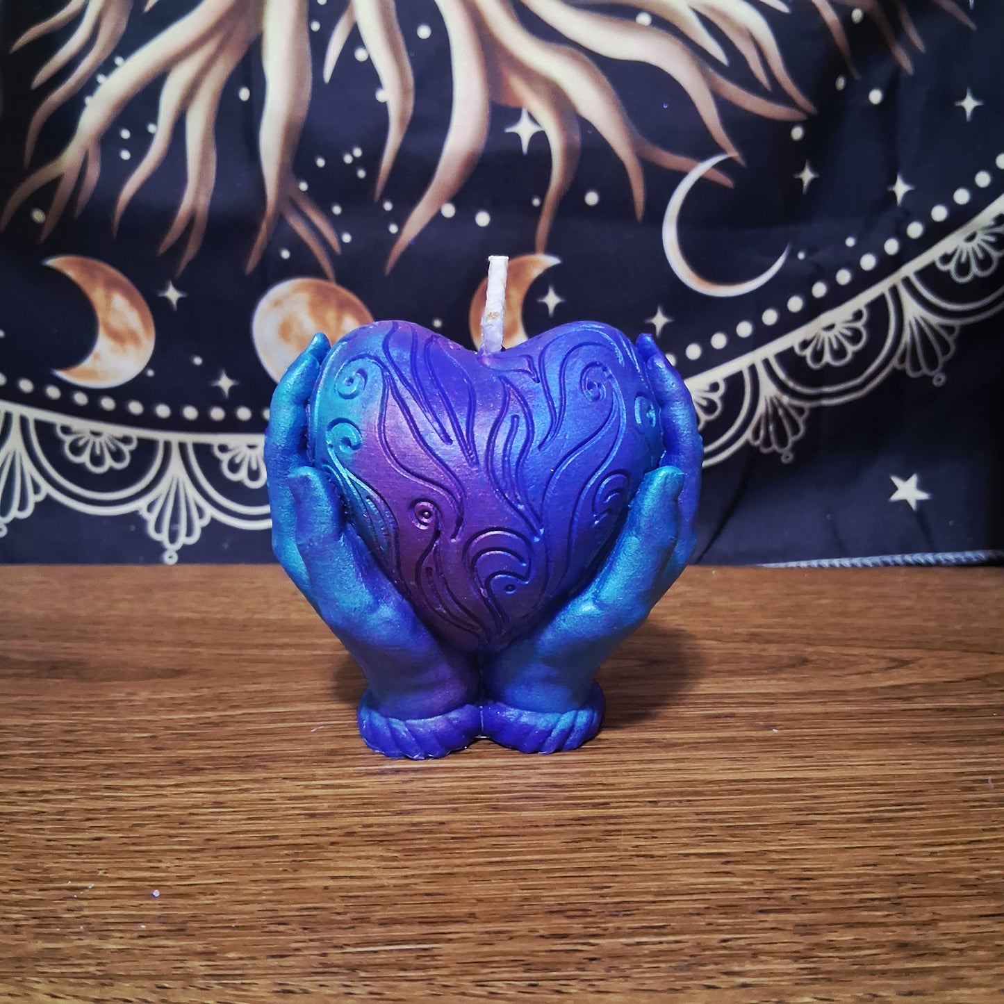 Celestial Embrace Flaming Heart in Hands Candle