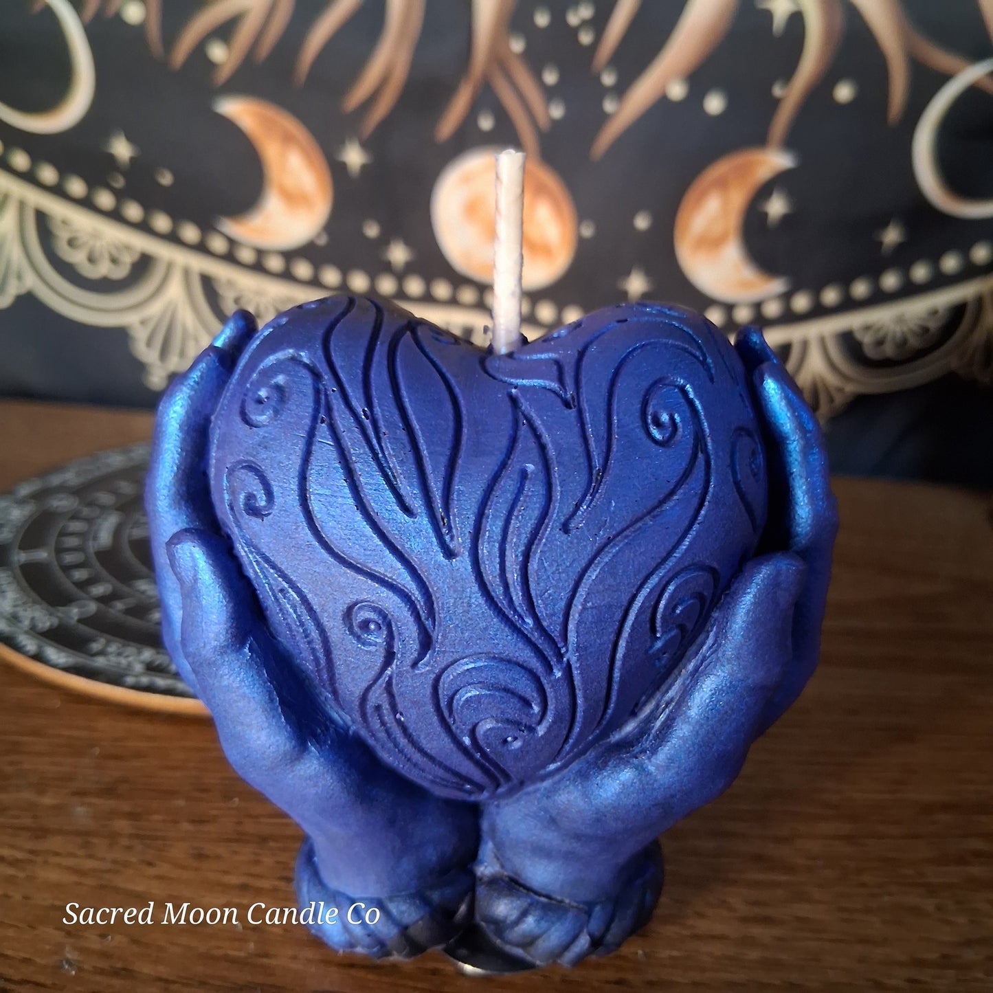 The Alchemist Embrace Saffron and Patchouli Scented Heart in Hands Candle