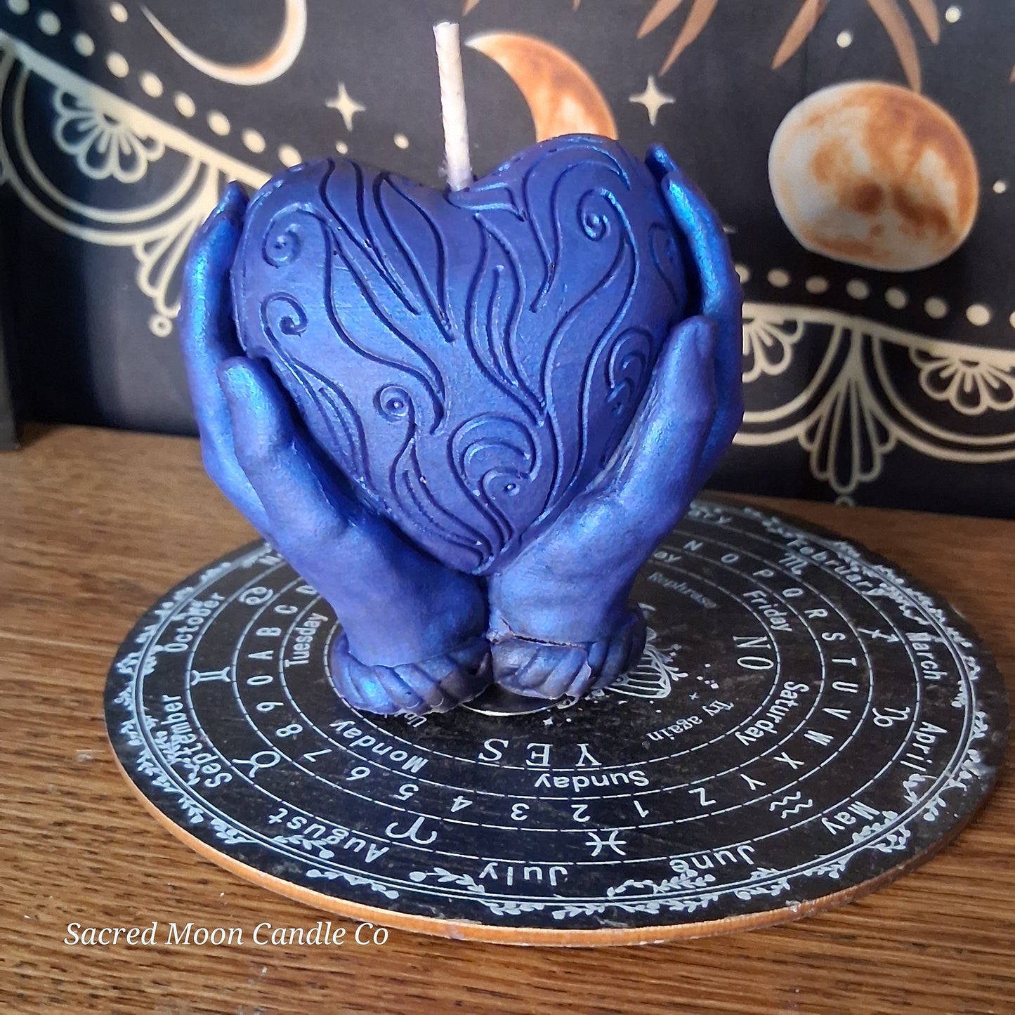 The Alchemist Embrace Saffron and Patchouli Scented Heart in Hands Candle