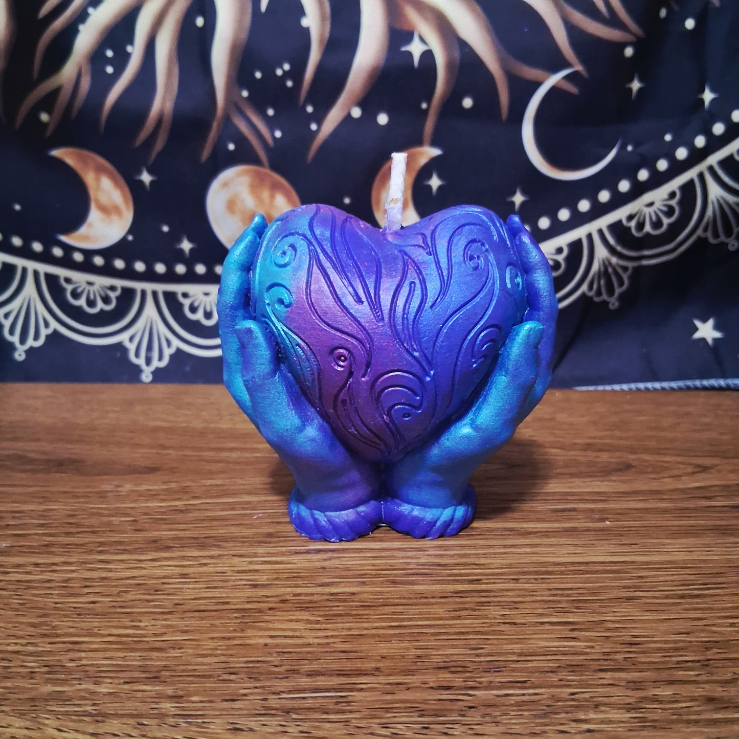 Celestial Embrace Flaming Heart in Hands Candle