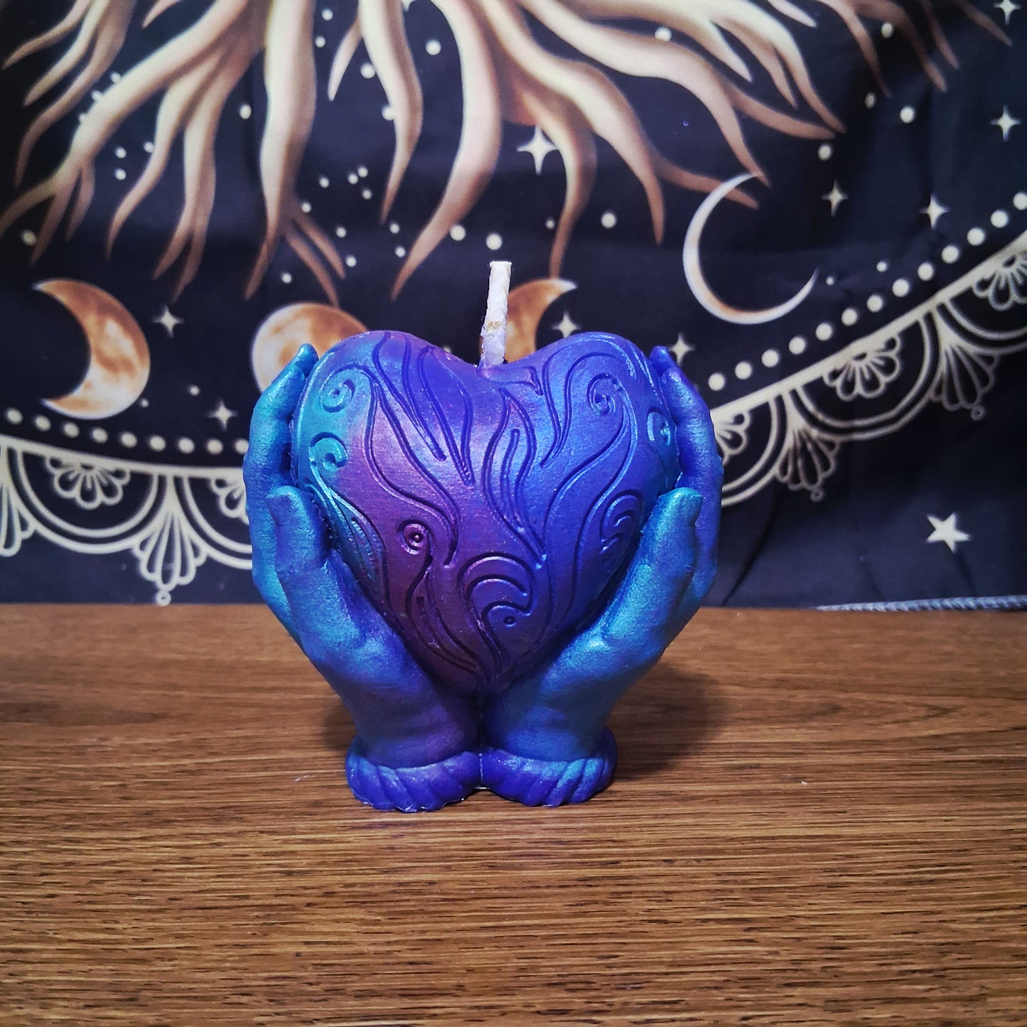 Celestial Embrace Flaming Heart in Hands Candle