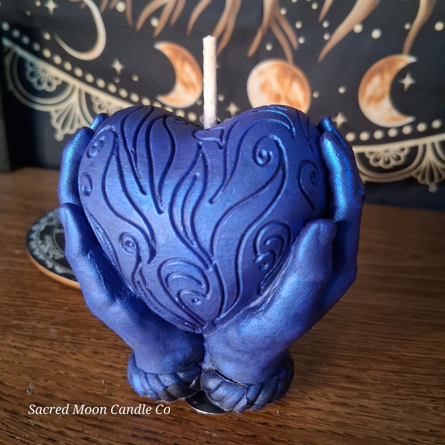 The Alchemist Embrace Saffron and Patchouli Scented Heart in Hands Candle