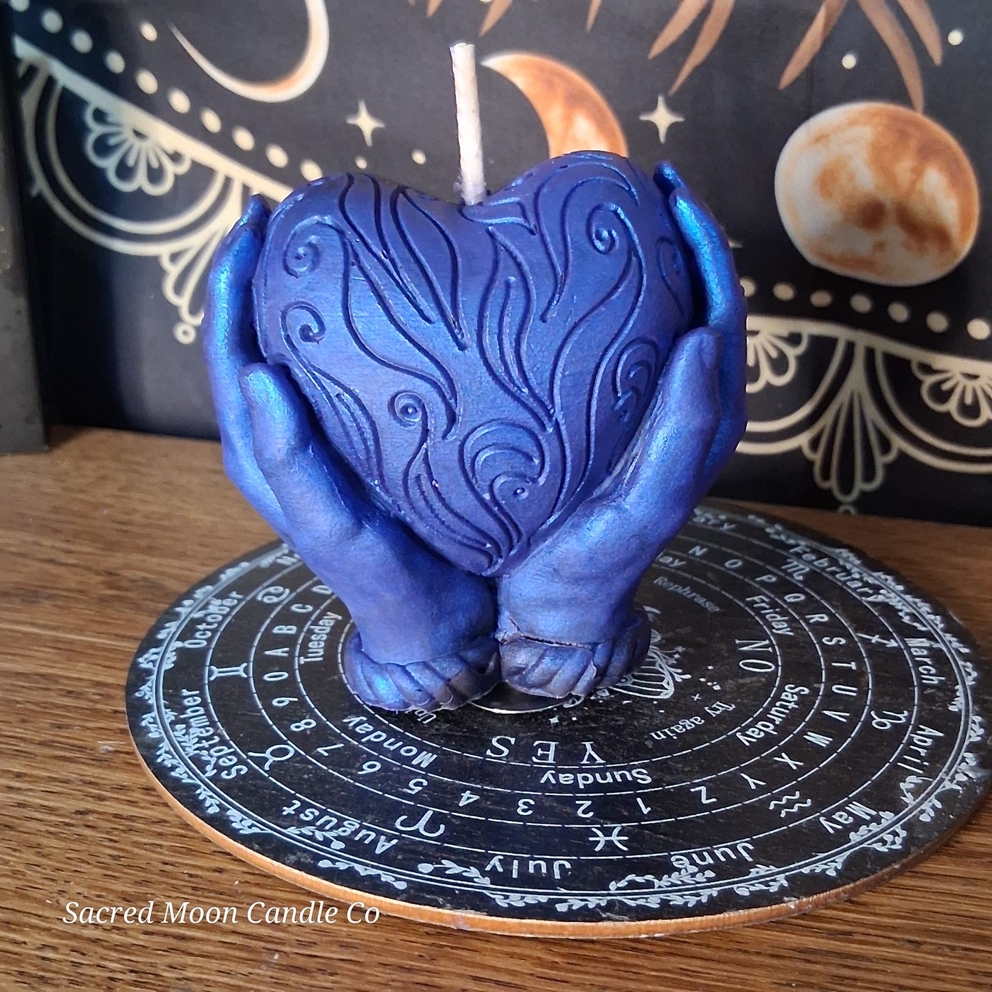 The Alchemist Embrace Saffron and Patchouli Scented Heart in Hands Candle