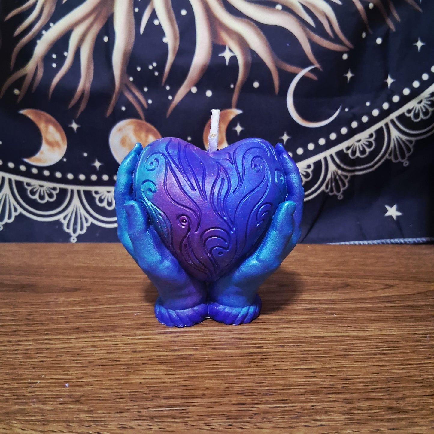 Celestial Embrace Flaming Heart in Hands Candle