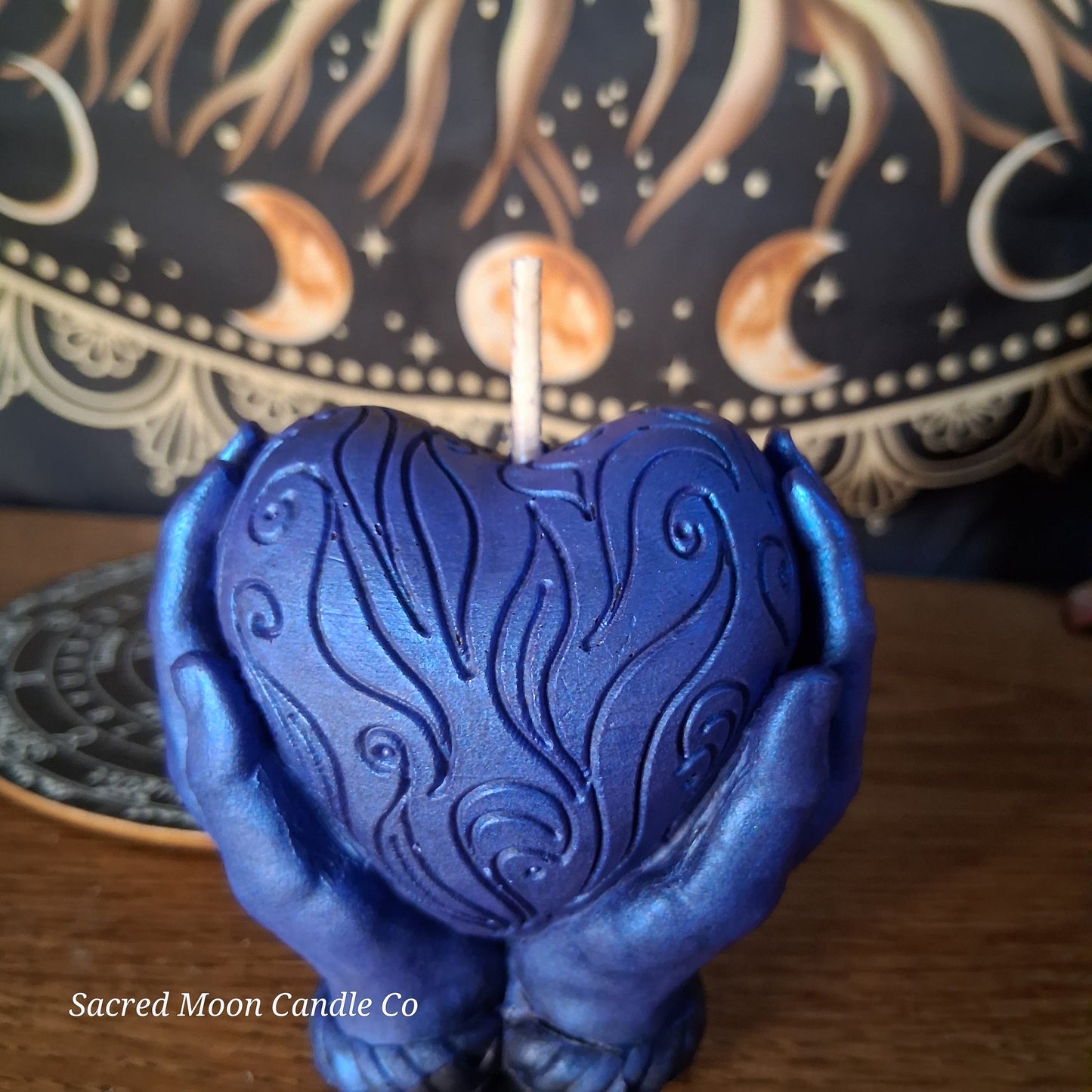 The Alchemist Embrace Saffron and Patchouli Scented Heart in Hands Candle