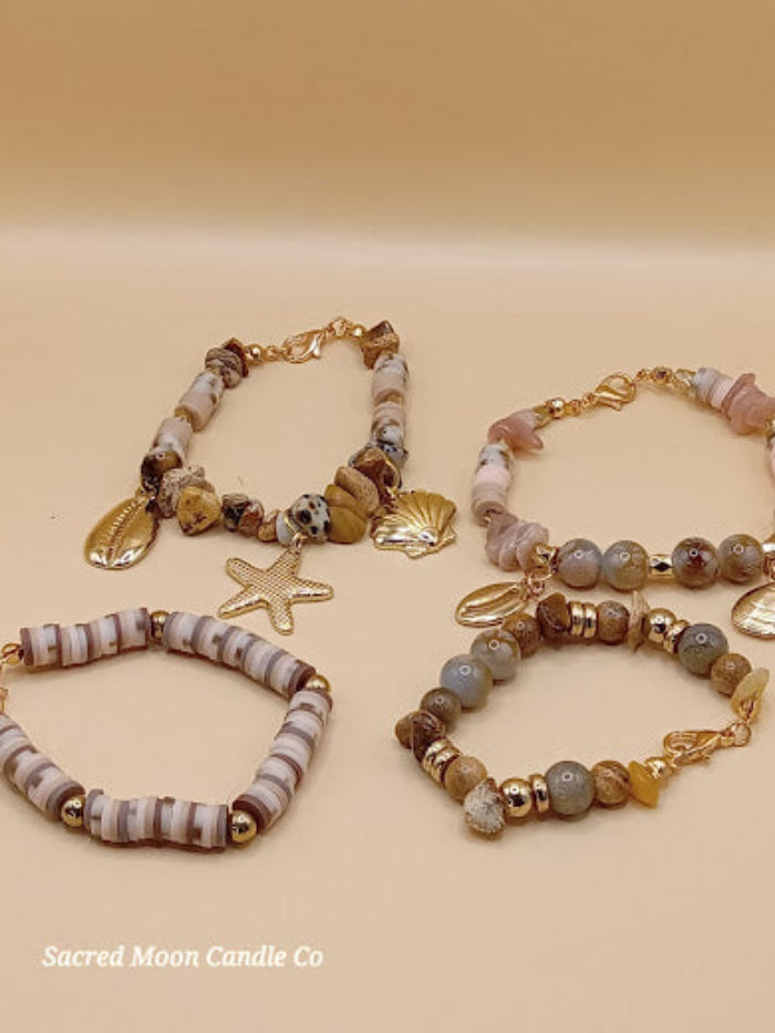 Bohemian natural stone bracelet stack with gold charms and beads by Sacred Moon Candle Co