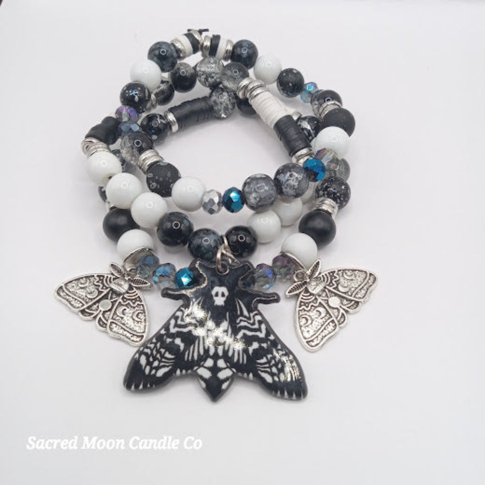 Lunar moth jewelry set bracelet by Sacred Moon Candle Co with black white beads and silver moth charms