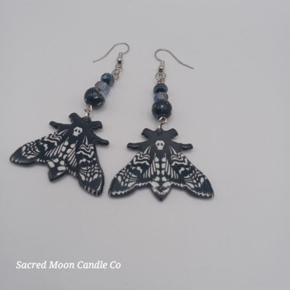 Lunar moth jewelry set earrings with black and white moth design and blue beads by Sacred Moon Candle Co