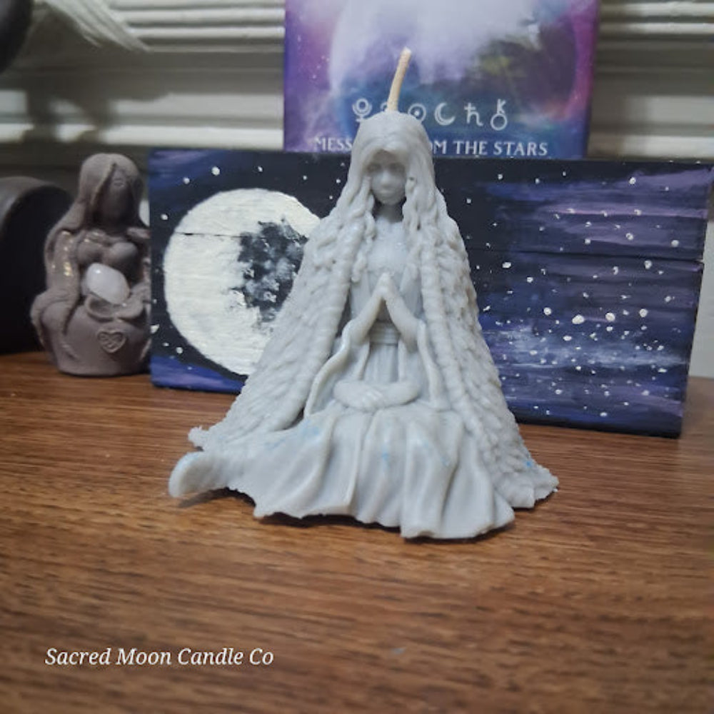 Sacred Moon Candle Co Mother Earth goddess candle white sculpted seated goddess with braided hair
