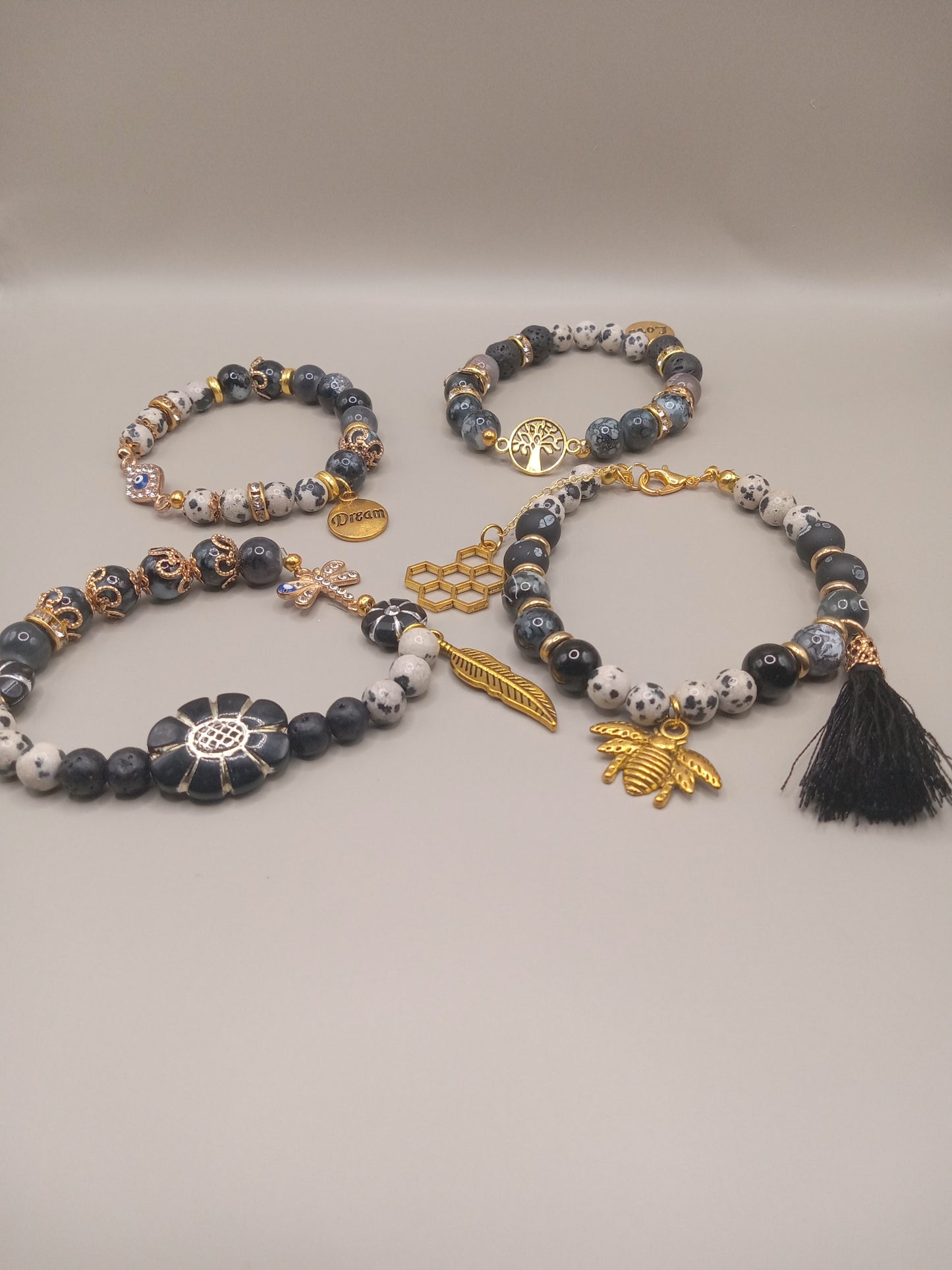 One with Nature Bohemian Dalmatian Jasper Bracelet Stack gray white spotted beads with gold bee tassel feather flower charms