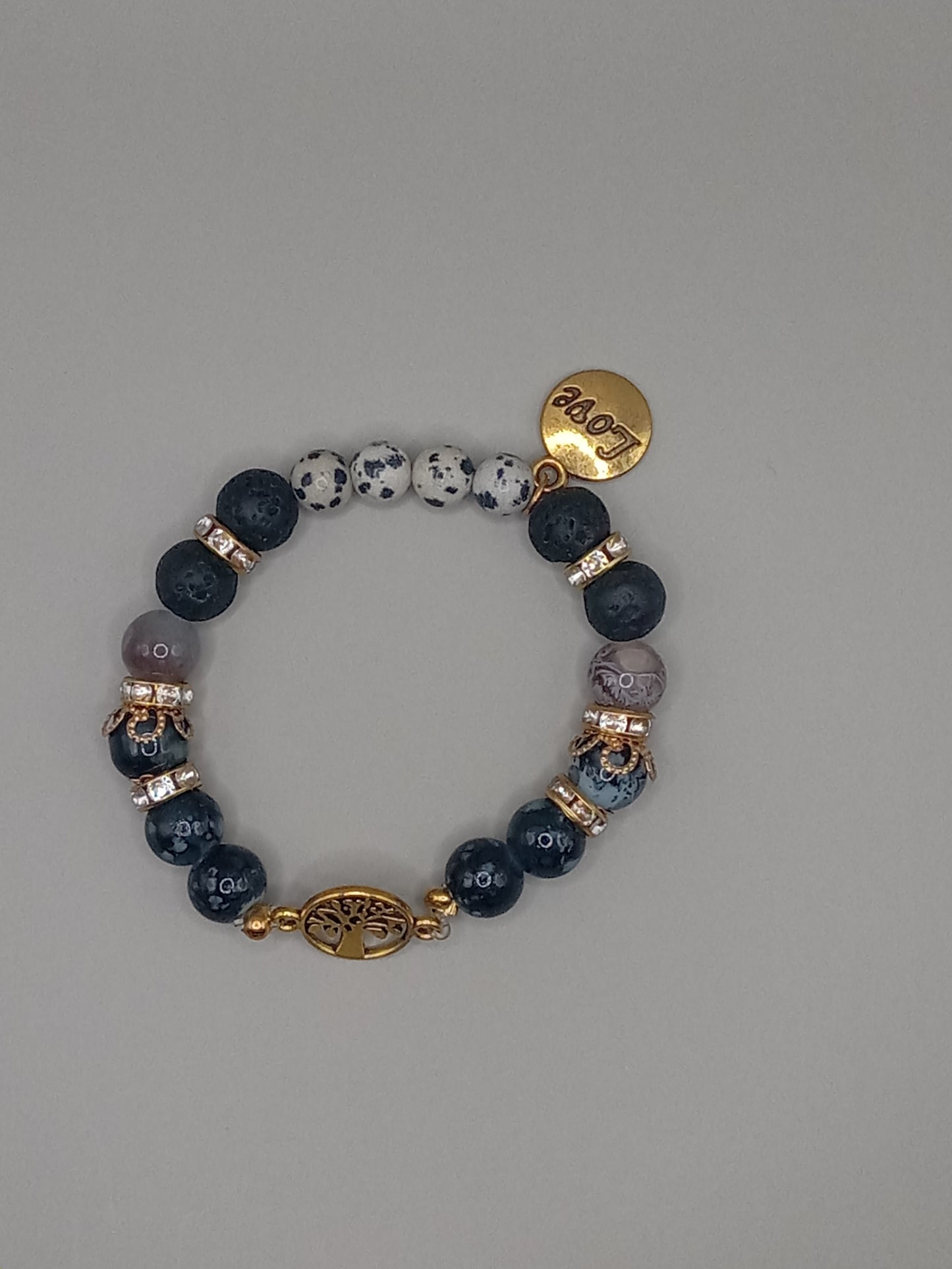 One with Nature Bohemian Dalmatian Jasper Bracelet Stack boho bracelet with gold tree charm and lava spotted jasper beads