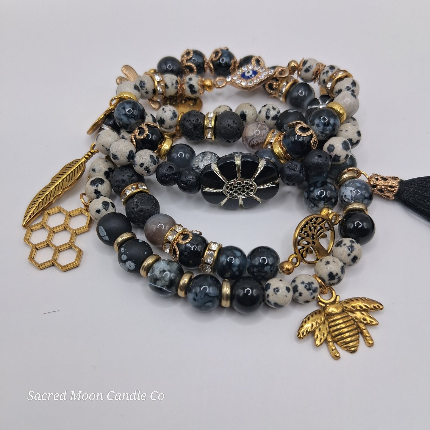 One with Nature Bohemian Dalmatian Jasper Bracelet Stack with gold bee feather honeycomb and tassel charms