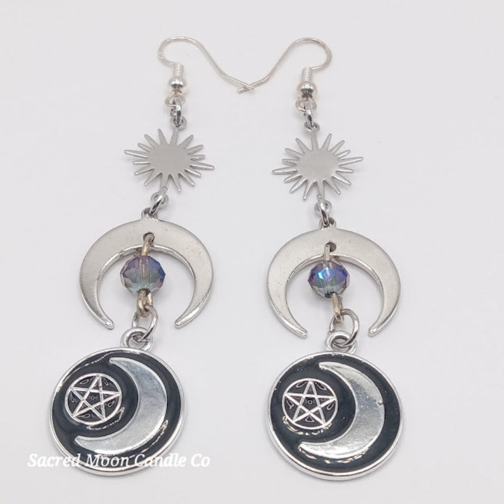 Sacred Moon Candle Co pentacle moon dangle earrings with crescent moons and star charms in silver tone