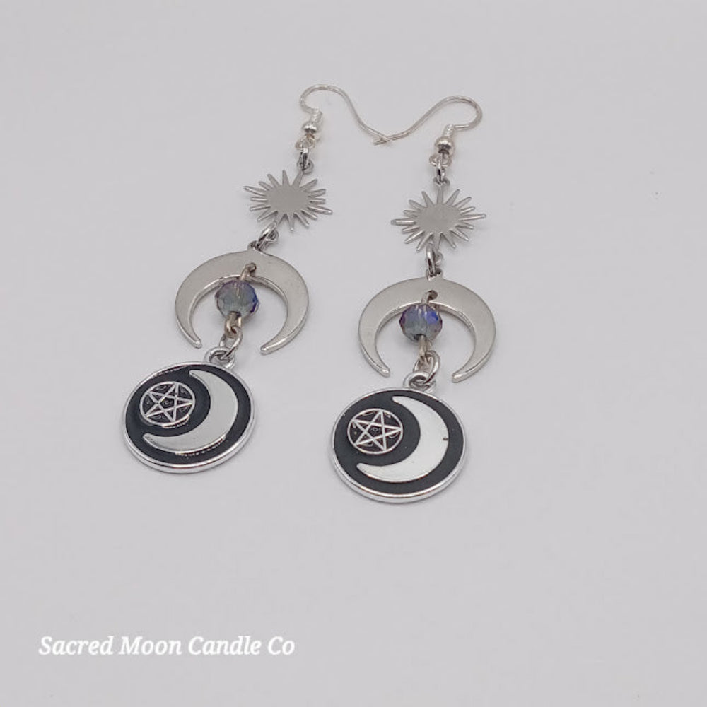 Sacred Moon Candle Co pentacle moon dangle earrings featuring crescent moons and star charms