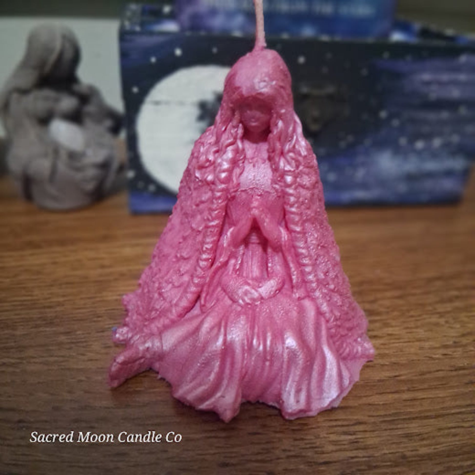 Seated pink goddess altar candle with braided hair and praying hands pink water lily goddess candle for altar soy beeswax blend