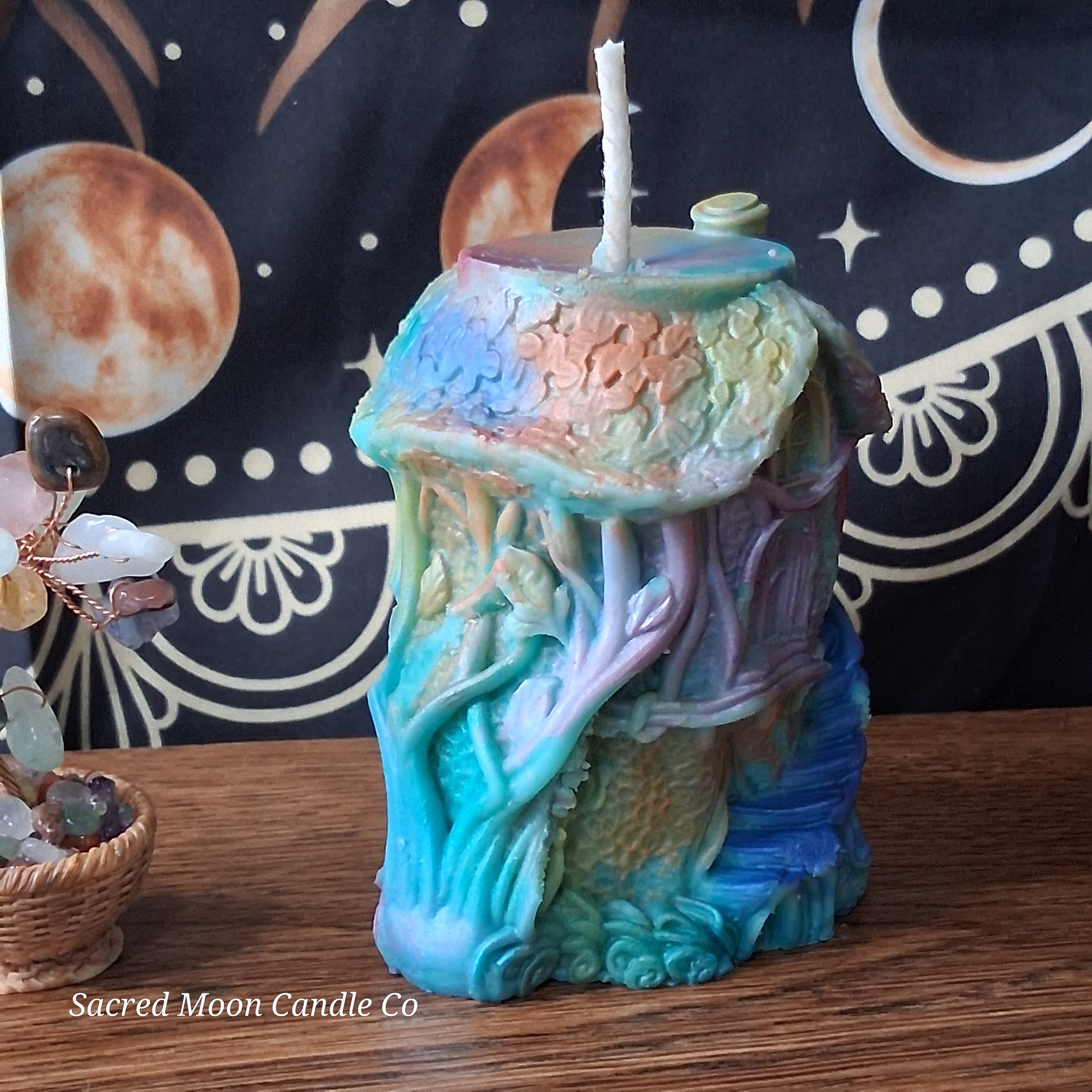 Rainbow Sherbert Sweet Blossom Scented Treehouse Candle by Sacred Moon Candle Co shaped like a colorful treehouse