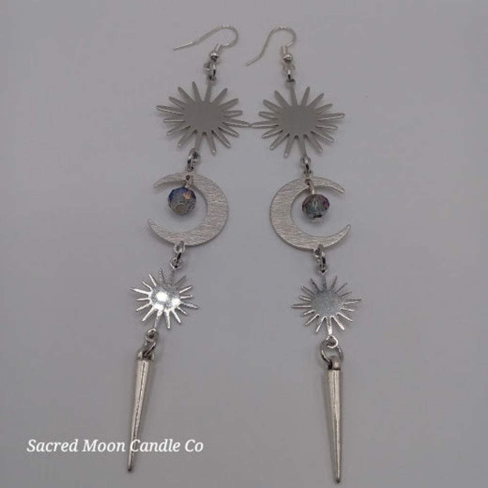Sacred Moon Candle Co silver spiked moon dangle earrings with sun and moon charms
