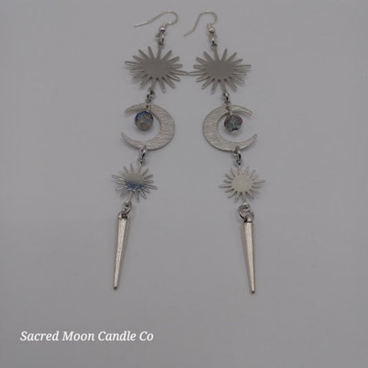 Sacred Moon Candle Co spiked moon dangle earrings with sun, crescent moon, and spike charms in silver