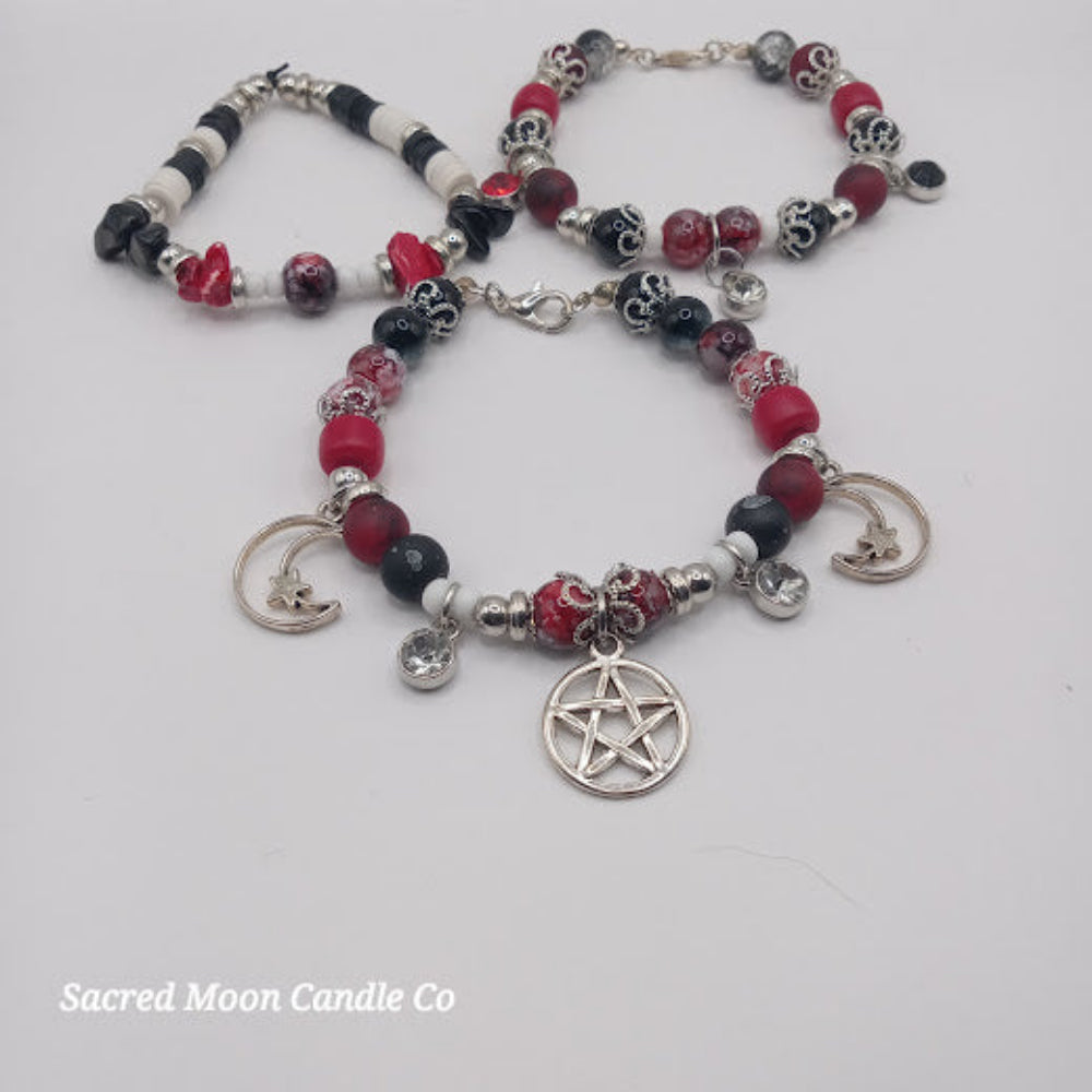 Triple Moon Goddess pentacle charm bracelet set with red black beads and silver charms by Sacred Moon Candle Co