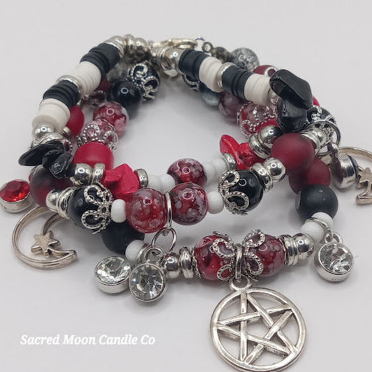 Triple Moon Goddess pentacle charm bracelet set by Sacred Moon Candle Co featuring red black and silver beads