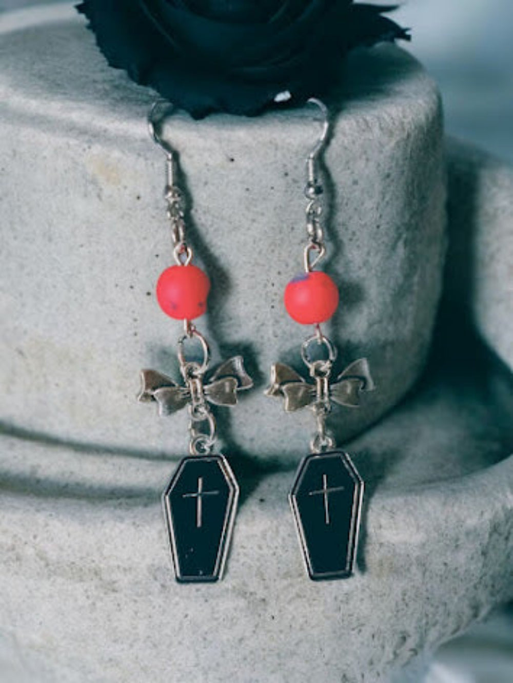 Sacred Moon Candle Co coffin and bow dangle earrings with black coffin charms and silver bows