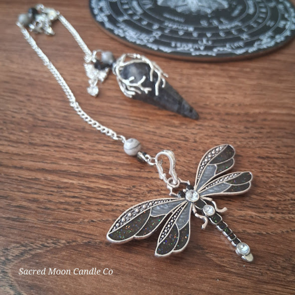 Larvikite moon pendulum with dragonfly charm on silver chain for altar tools by Sacred Moon Candle Co