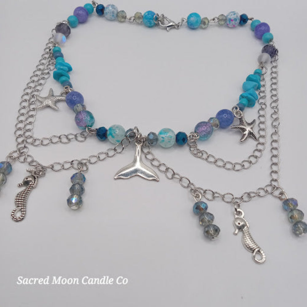 Mermaid tail choker necklace with blue beads silver chains and sea creature charms by Sacred Moon Candle Co