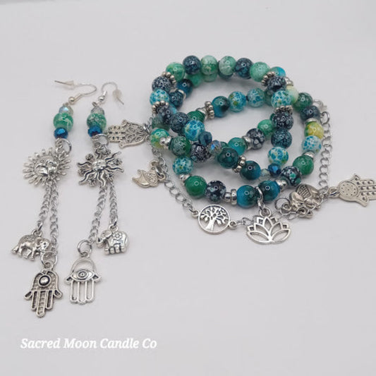 Teal boho earrings and bracelet stack with silver charm accents by Sacred Moon Candle Co