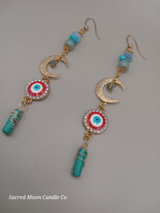 Sacred Moon Candle Co wire wrapped evil eye earrings with crescent moon and turquoise beads