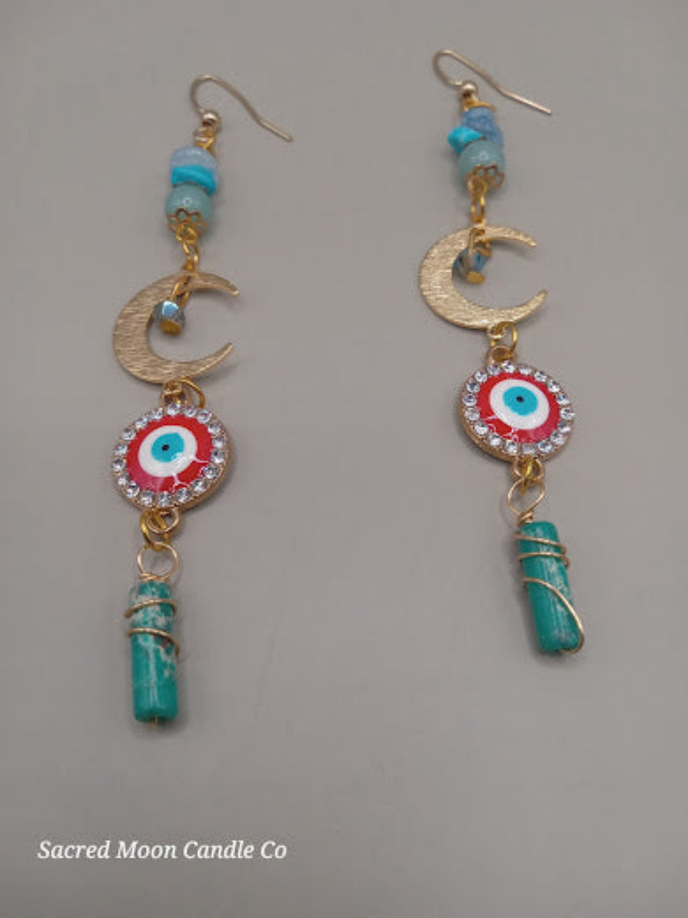 Wire wrapped evil eye earrings with turquoise stones and crescent moon charm by Sacred Moon Candle Co