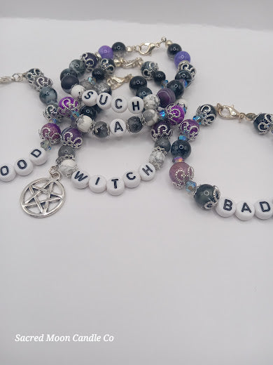 Sacred Moon Candle Co witch bracelet stack with letter beads and mystical charms