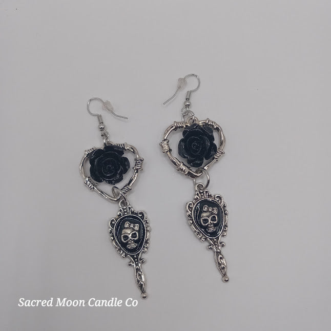 Sacred Moon Candle Co beautiful death hand mirror skull gothic heart rose dangle earrings with black rose and silver skull design