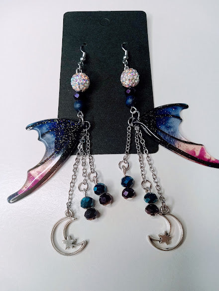 Blue magenta bat wing earrings with crescent moon charms and black beads by Sacred Moon Candle Co