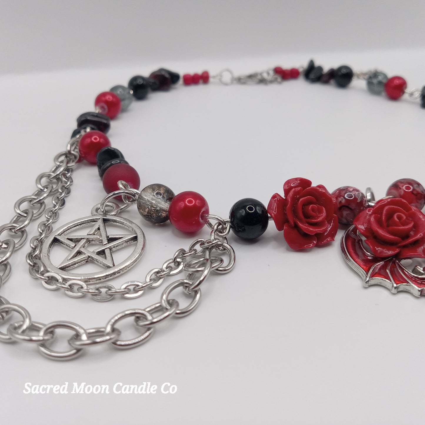 Handmade rose bat choker necklace with red roses black beads and silver pentagram charm by Sacred Moon Candle Co