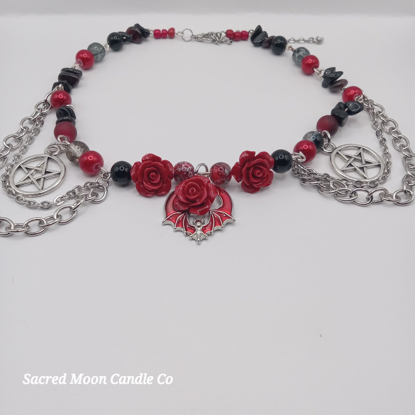 Sacred Moon Candle Co handmade rose bat choker with red roses black beads and silver pentagram chains