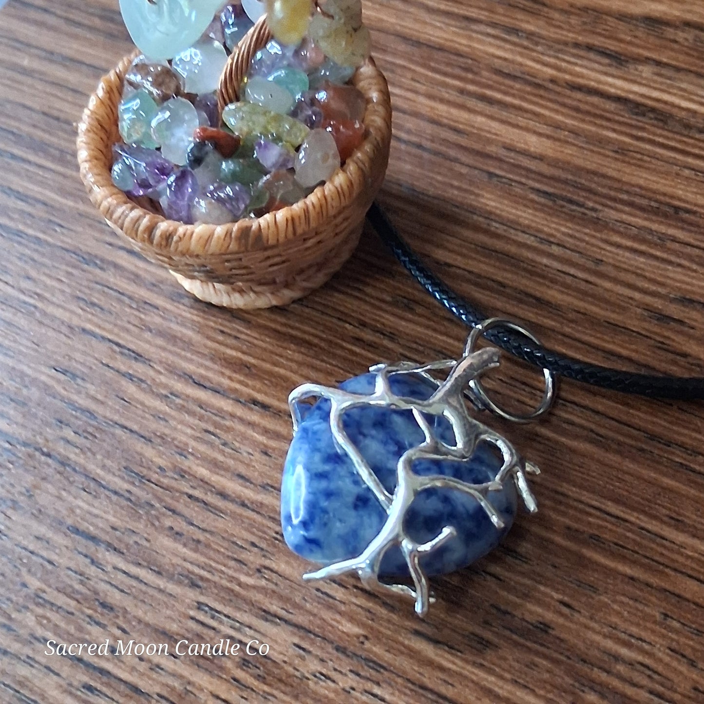 Lapis Lazuli Tree Branch Wrapped Heart Stone Pendant Necklace by Sacred Moon Candle Co on black cord close up 3