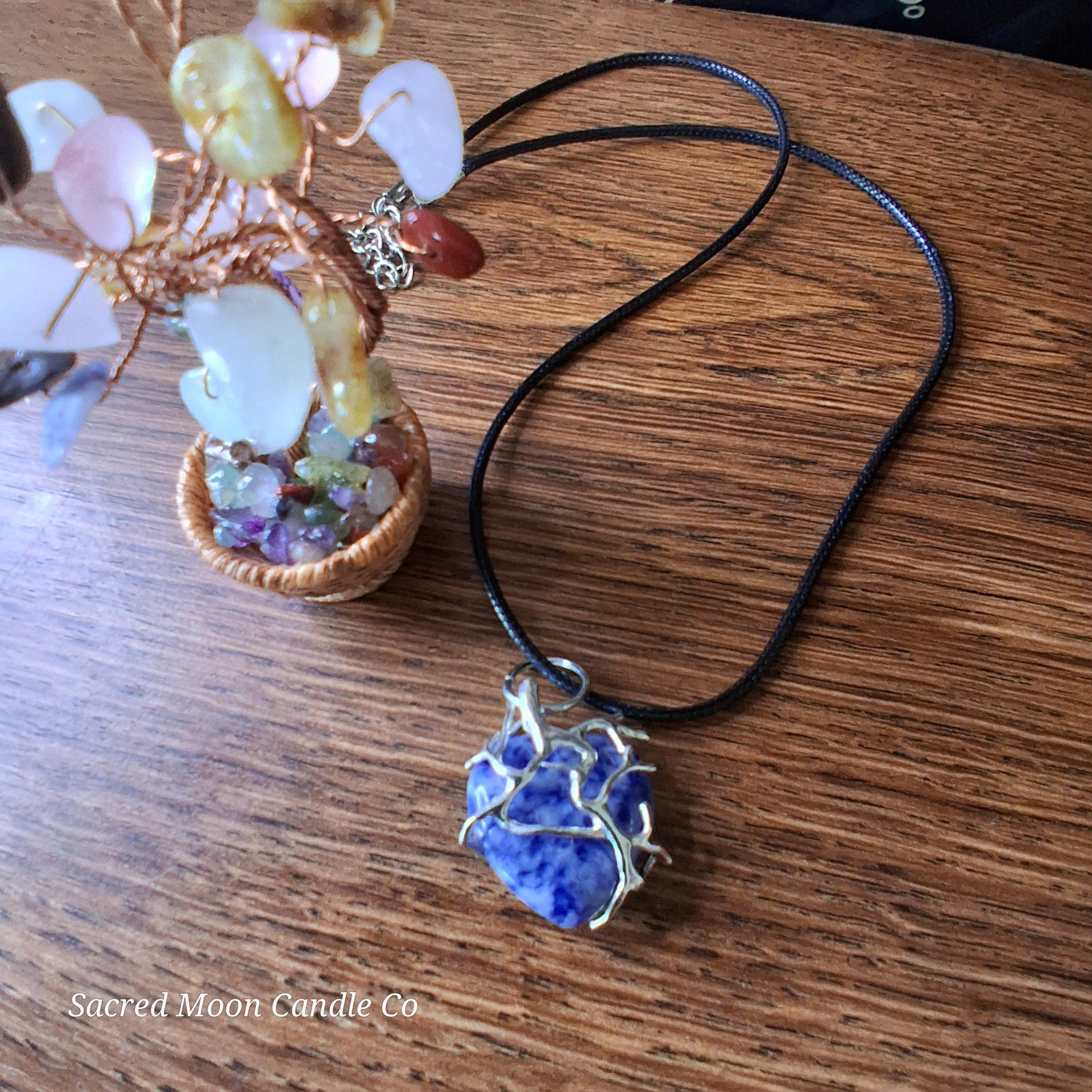 Lapis Lazuli Tree Branch Wrapped Heart Stone Pendant Necklace by Sacred Moon Candle Co on black cord close up 2