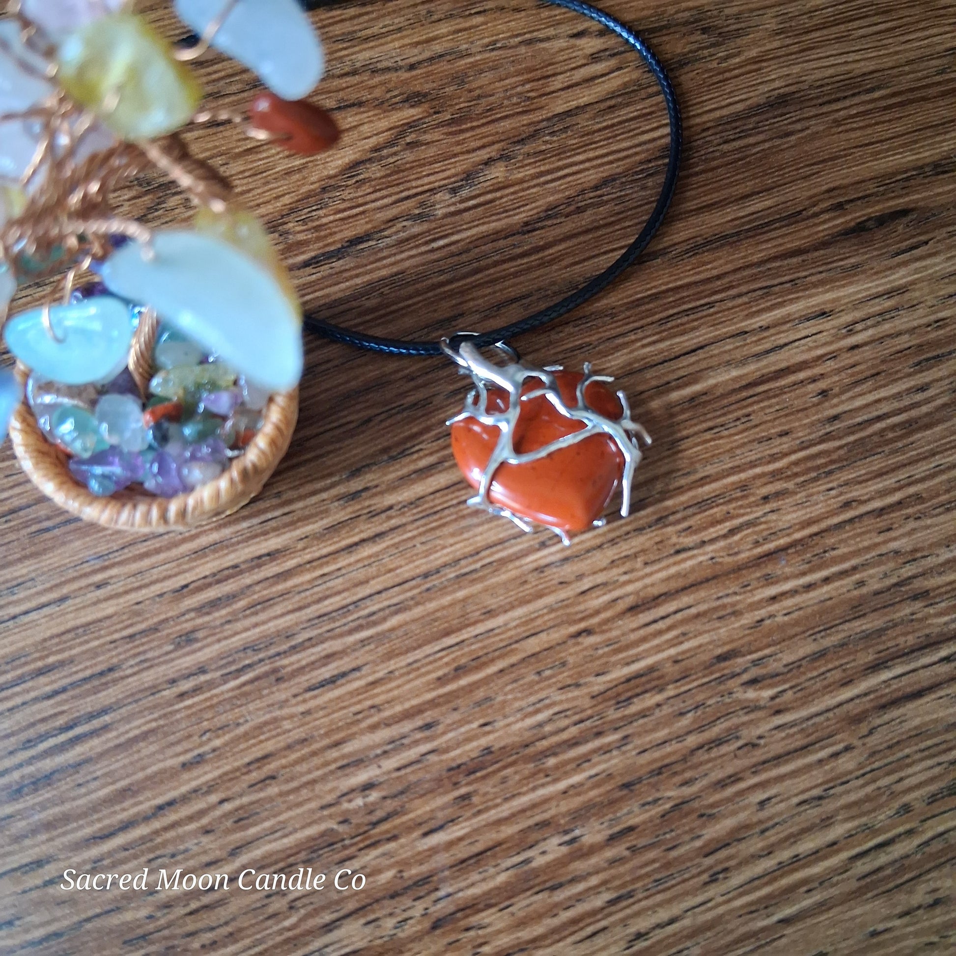 Red Jasper Tree Branch Wrapped Heart Stone Pendant Necklace on black cord by Sacred Moon Candle Co top veiw 