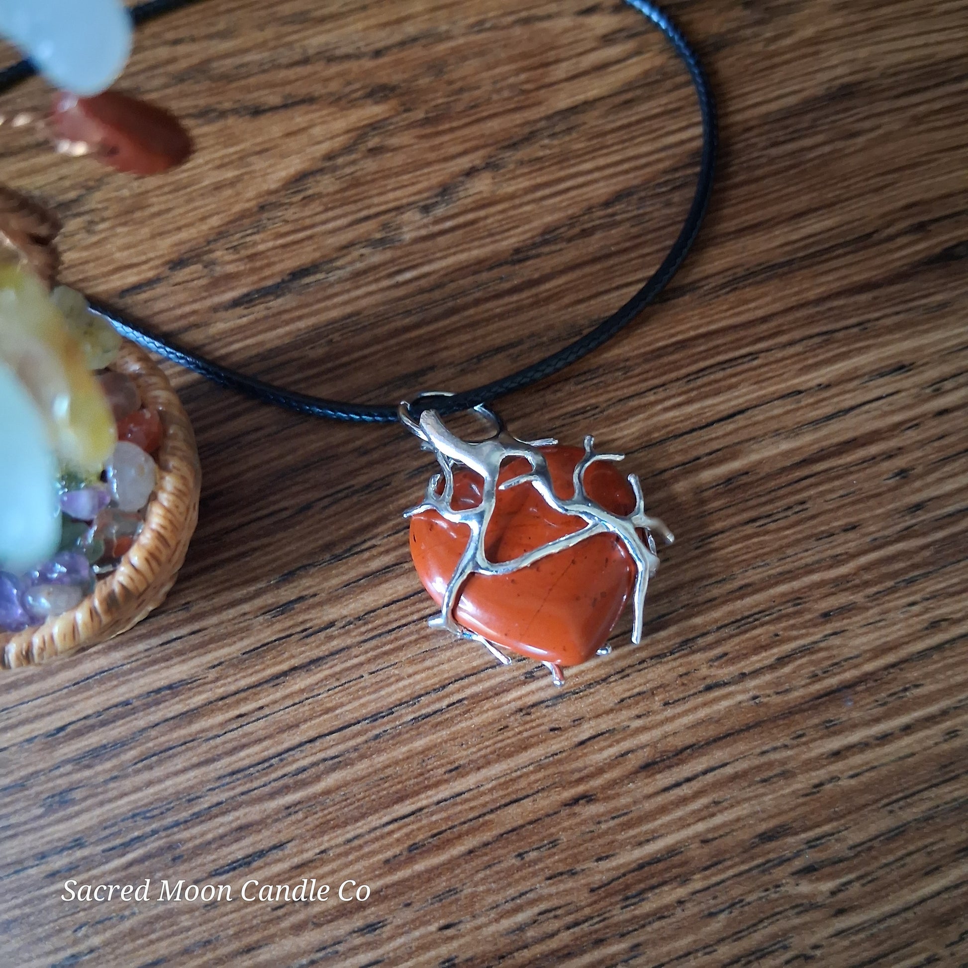 Red Jasper Tree Branch Wrapped Heart Stone Pendant Necklace on black cord by Sacred Moon Candle Co close up 3