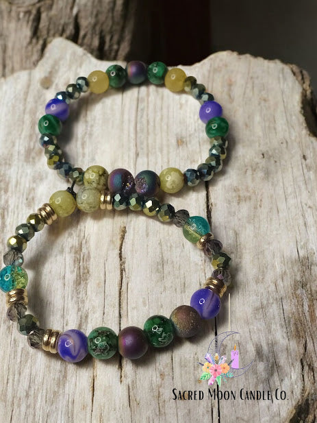 Sacred Moon Candle Co so fking zen affirmation bracelet featuring green purple and yellow beads on rustic wood