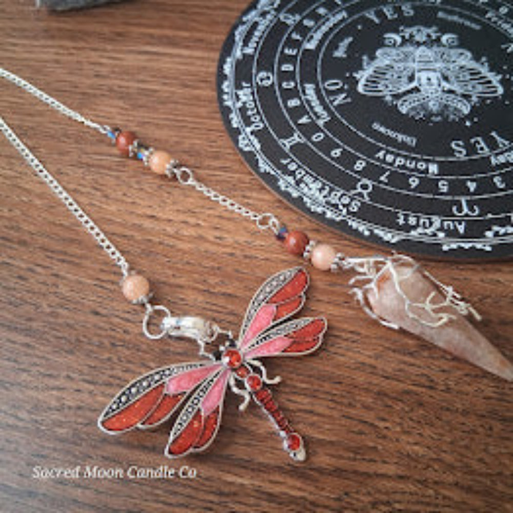 Sunstone dragonfly pendulum for divination with red wings and wooden beads on silver chain from Sacred Moon Candle Co