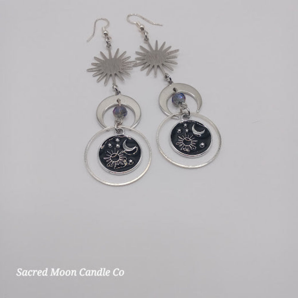 Sacred Moon Candle Co celestial earrings for women with sun, moon, and star design in silver tones