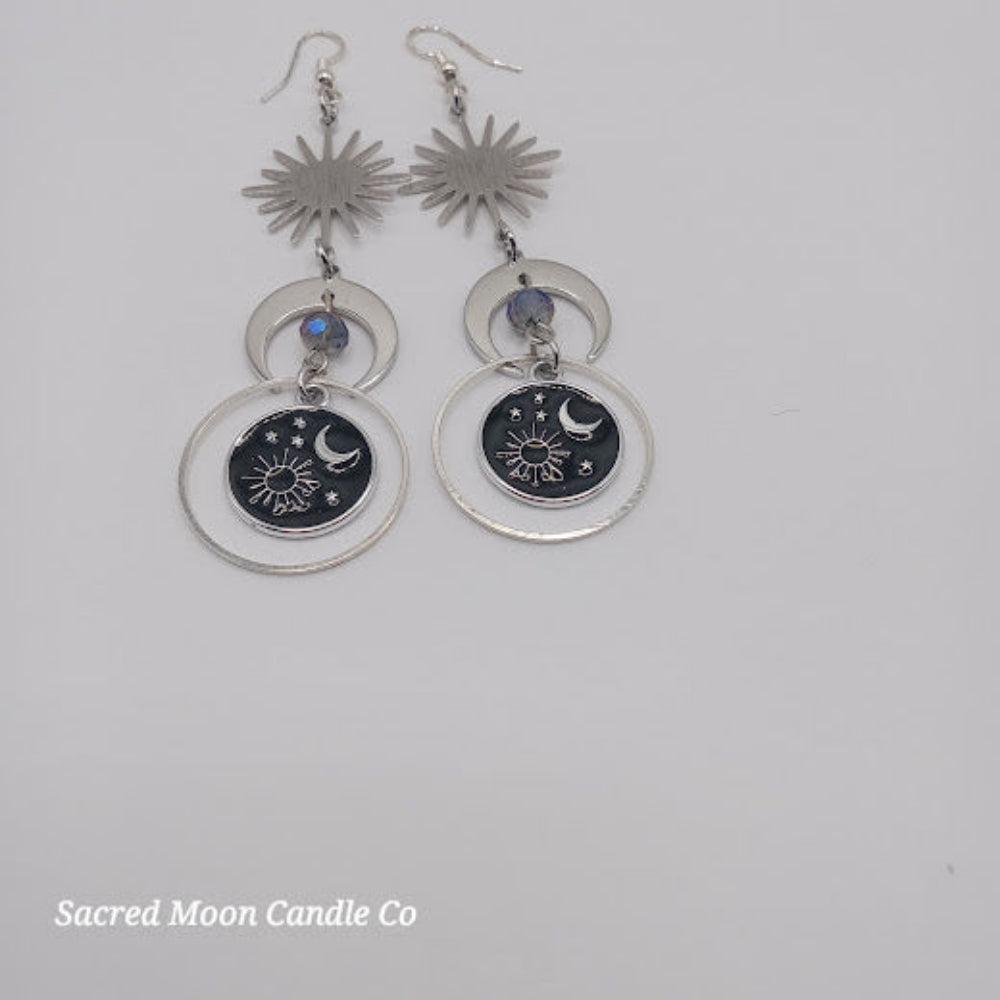 Sacred Moon Candle Co silver celestial earrings for women with sun moon star design and dangling charms
