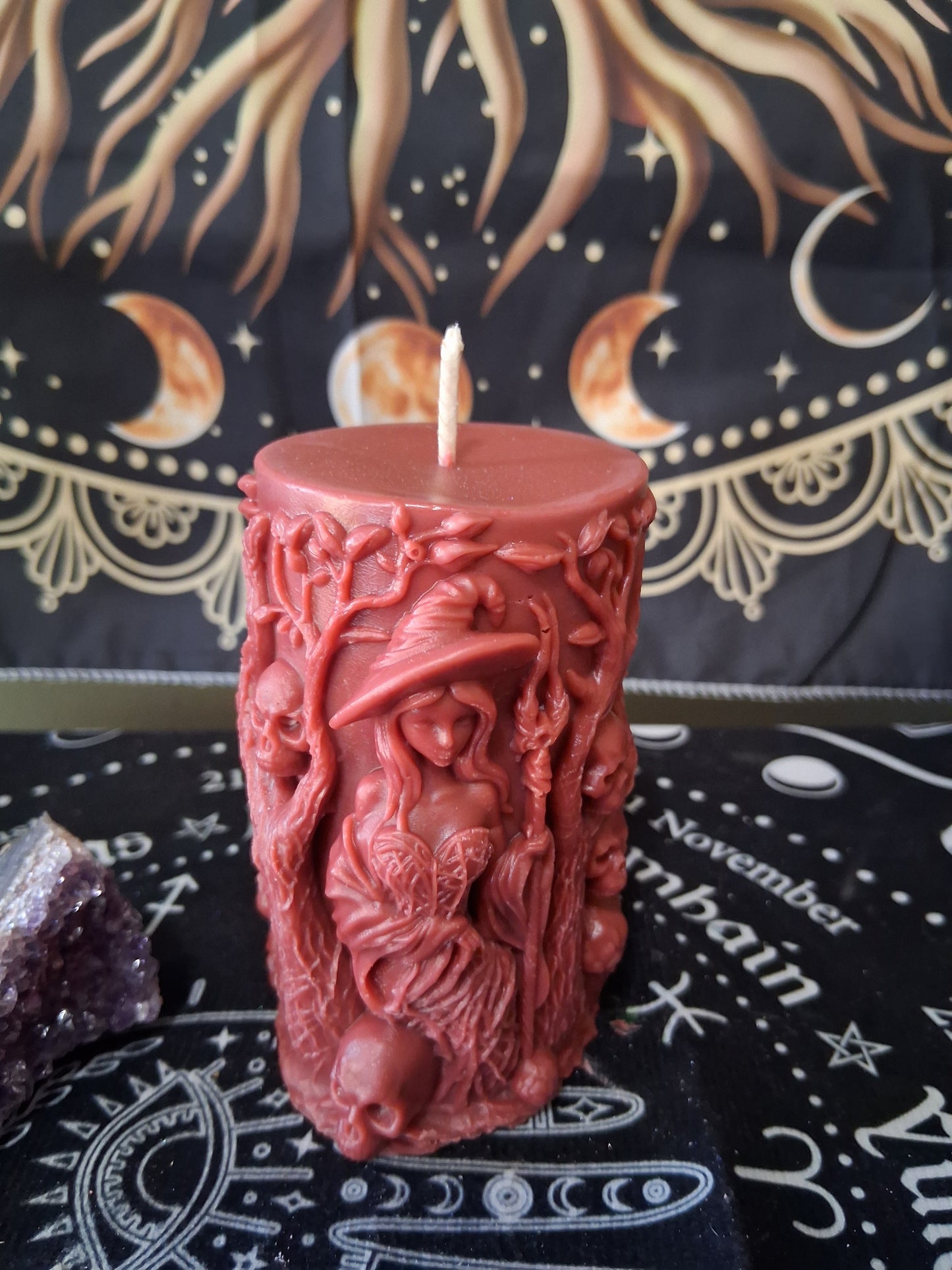 Sacred Moon Candle Co Siren's Blossom scented witch pillar candle with intricate witch and tree design