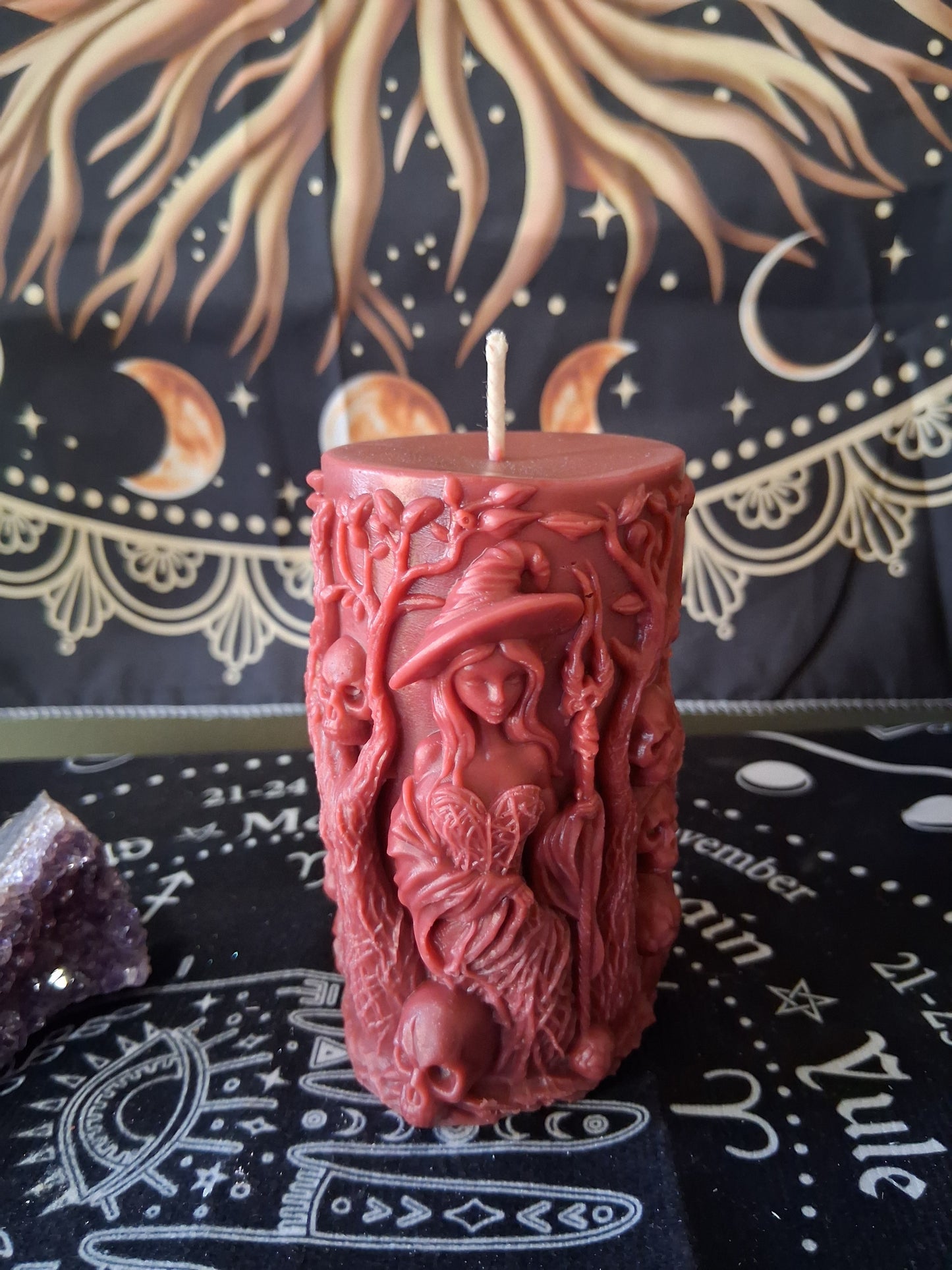 Siren's Blossom scented witch pillar candle by with detailed witch and skull design