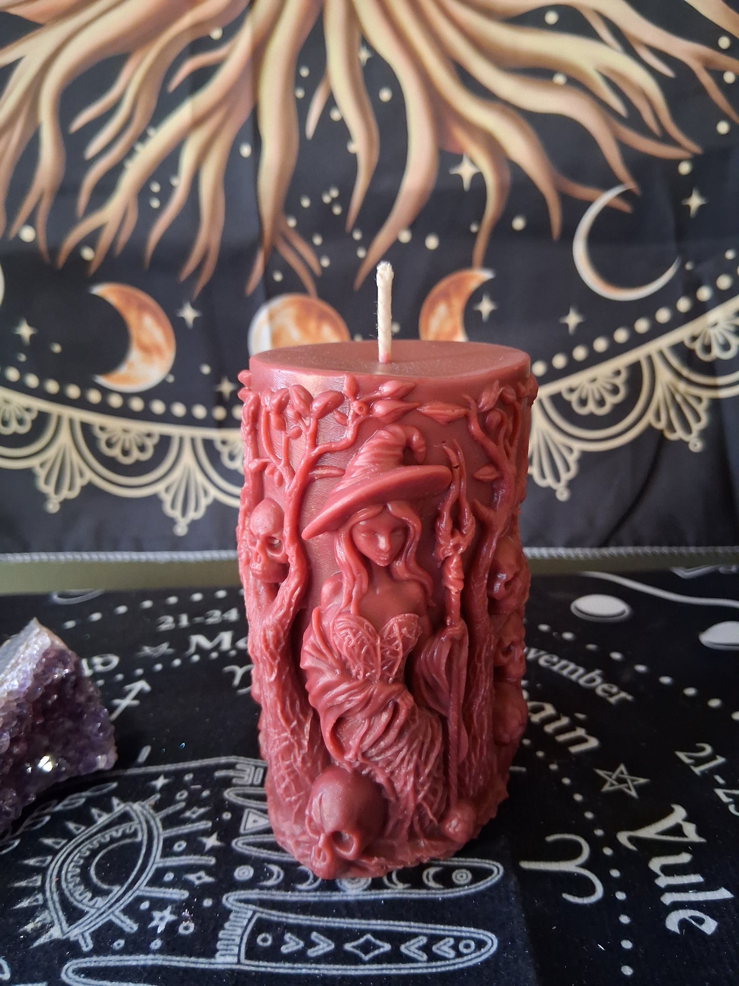 Siren's Blossom scented witch pillar candle by Sacred Moon Candle Co with intricate witch and skull design