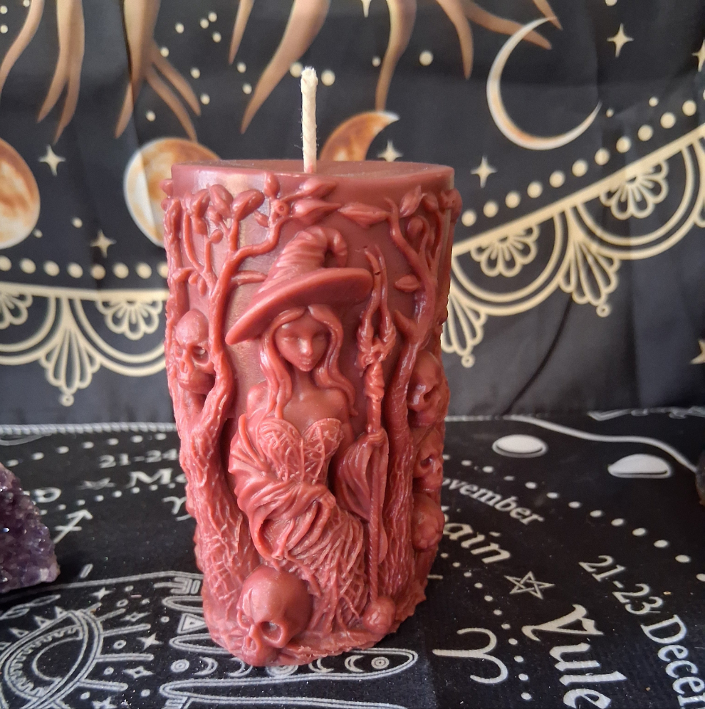 Red Siren's Blossom scented witch pillar candle by Sacred Moon Candle Co with detailed witch and tree carvings