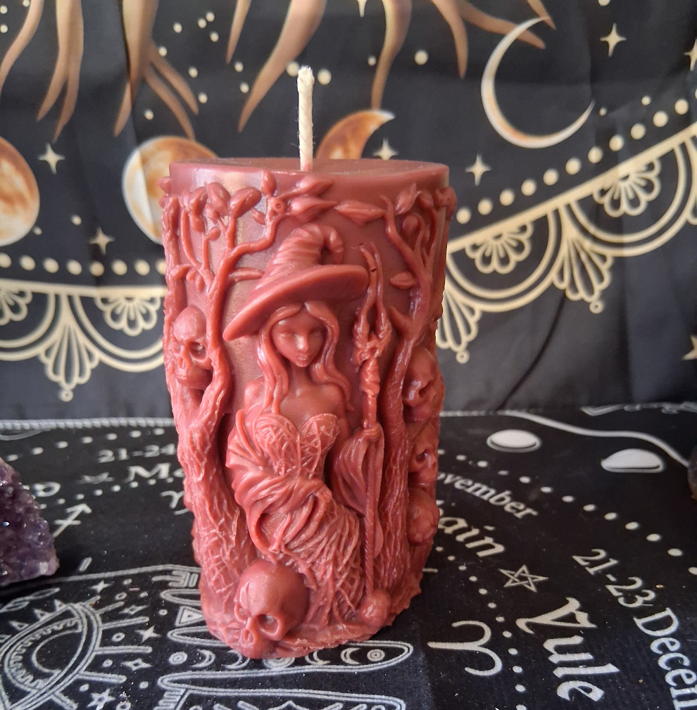 Sacred Moon Candle Co Siren's Blossom scented witch pillar candle with detailed witch and skull design